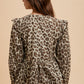 Annie Wear Tied Leopard Round Neck Peplum Blouse