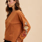 Annie Wear Embroidered Long Sleeve French Terry Top