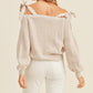 MABLE Off Shoulder Self Tie Strap Button Down Sweater