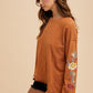 Annie Wear Embroidered Long Sleeve French Terry Top